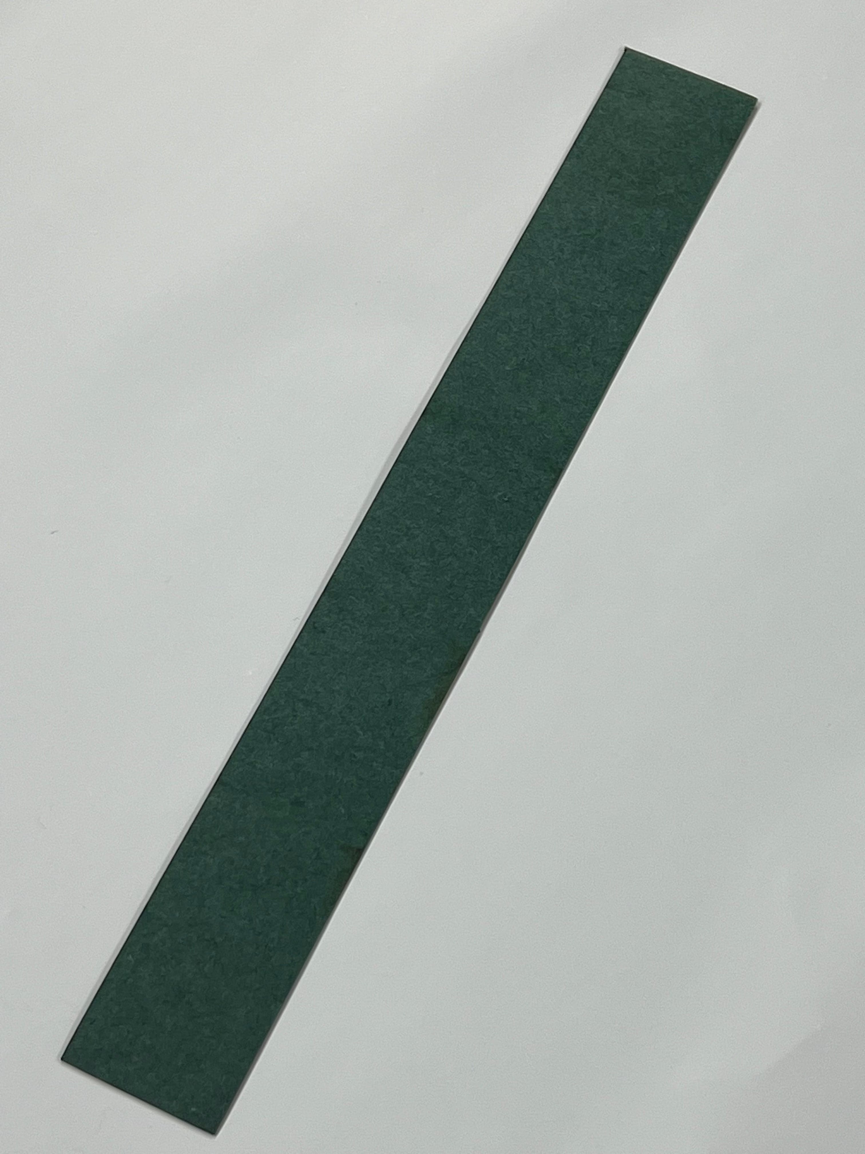 Vulkanisoitu kuituvälilevy (spacer/liner)